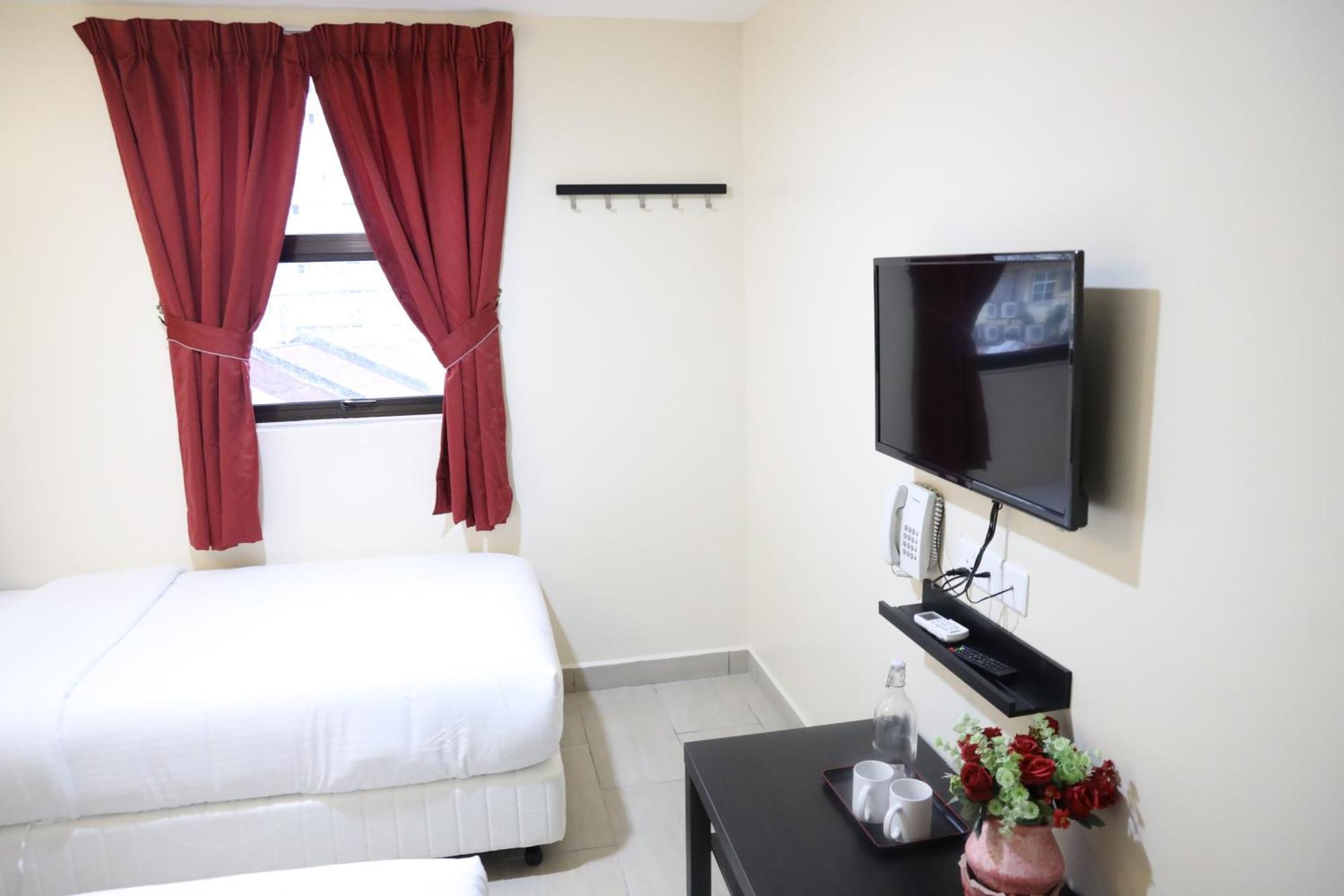 Capital O 90897 Island City Hotel George Town Kültér fotó